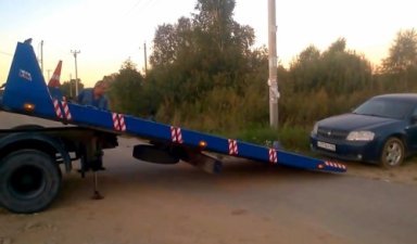 Погрузка легкового автомобиля на эвакуатор