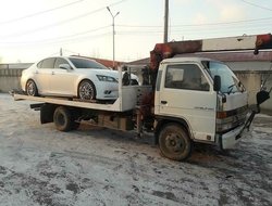 фото перевозки манипулятора на эвакуаторе с манипулятором