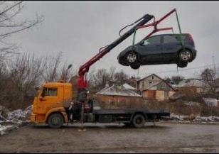 Фото эвакуатора с манипулятором