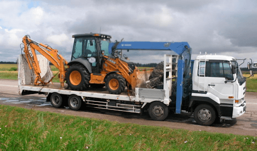 фото эвакуатор спецтехники в хабаровске