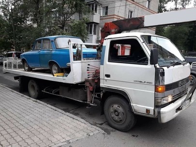 Фото процесса эвакуации с помощью манипулятора